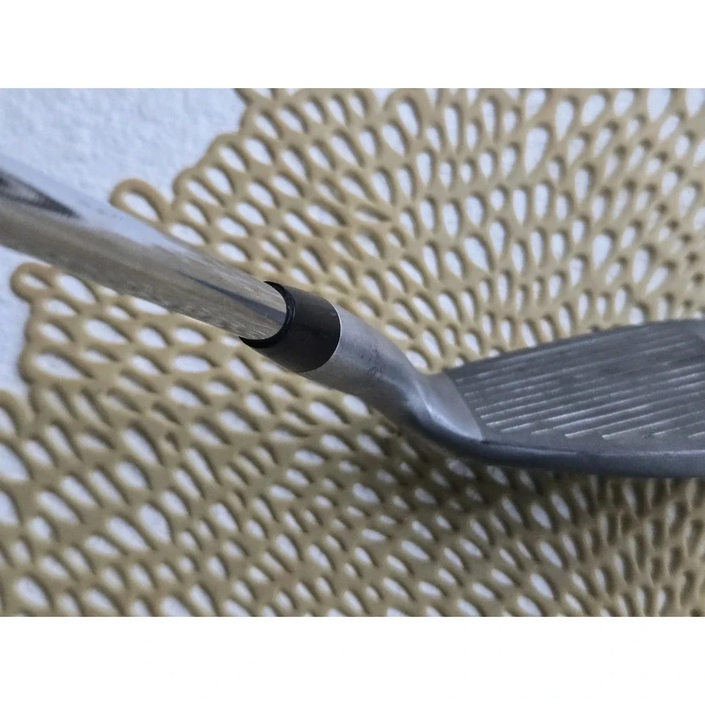 Wilson Ultra BLK iron, recognizable by the orange cavity.pitching Wedge 35.25
